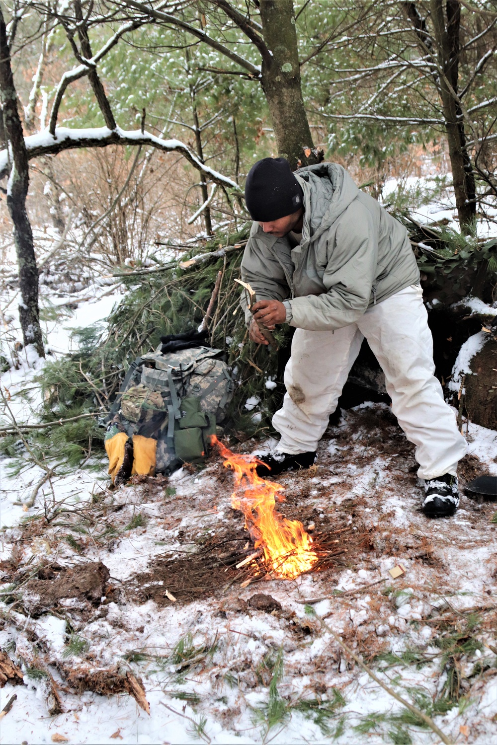 Cold-Weather Operations Course Class 20-02 students conduct field ops, improvised shelter construction
