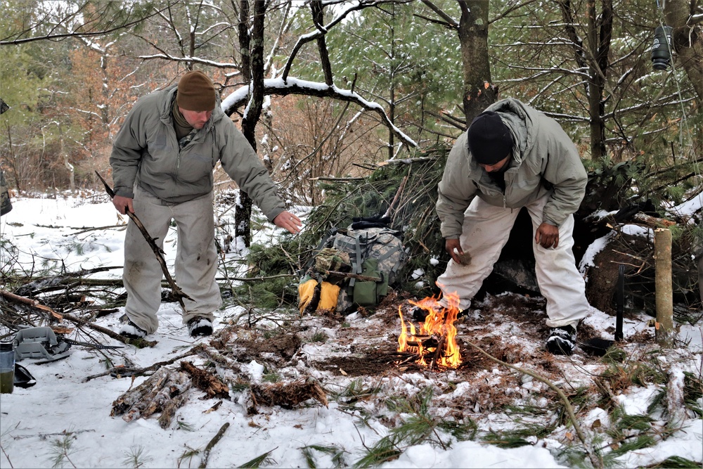 Cold-Weather Operations Course Class 20-02 students conduct field ops, improvised shelter construction
