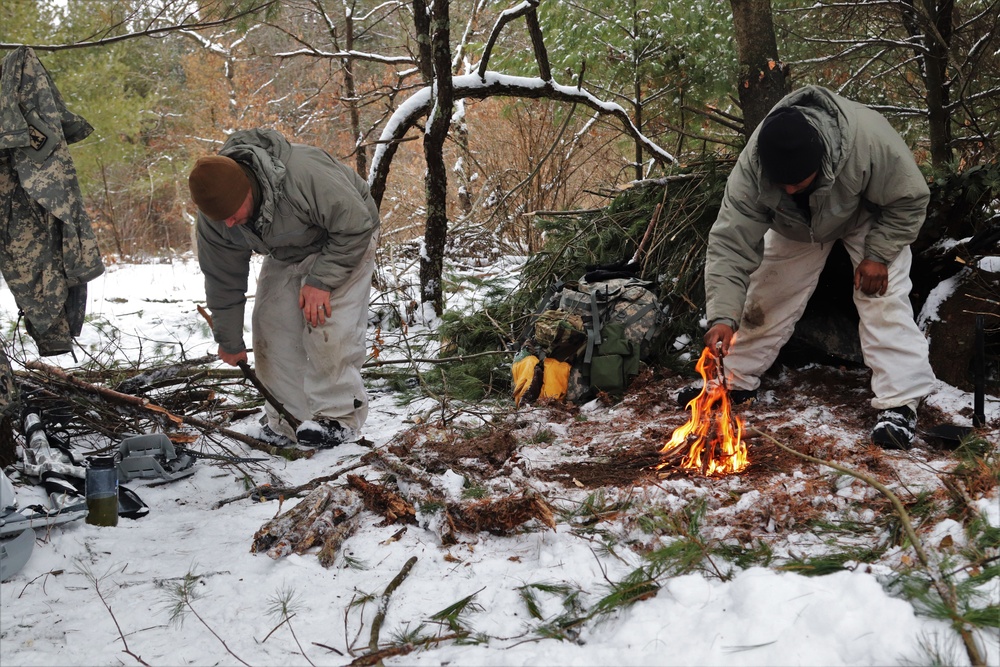 Cold-Weather Operations Course Class 20-02 students conduct field ops, improvised shelter construction