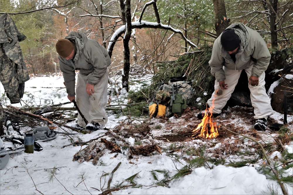 Cold-Weather Operations Course Class 20-02 students conduct field ops, improvised shelter construction