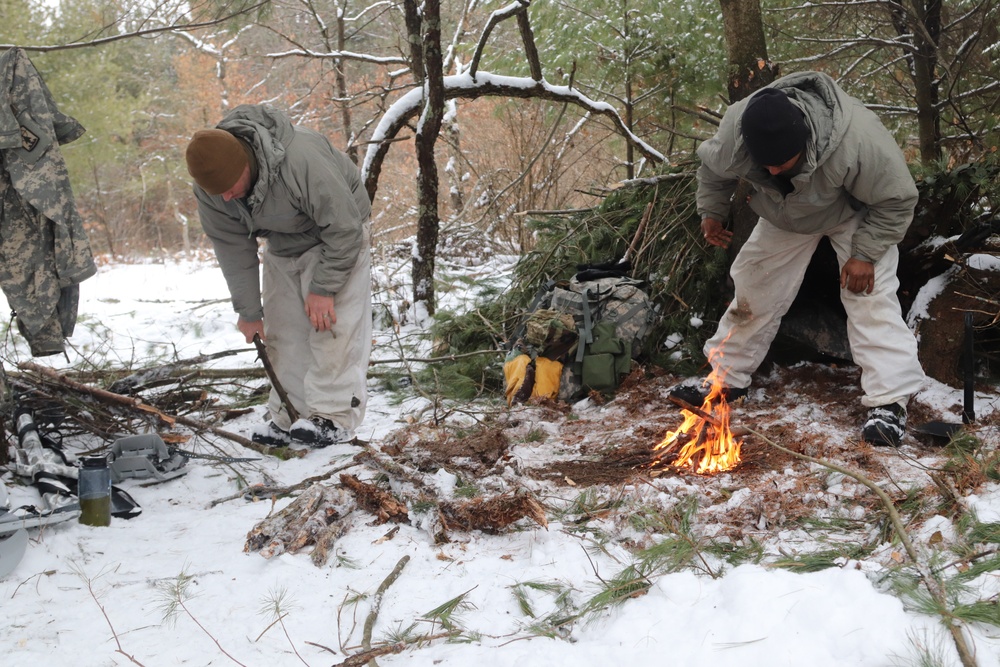Cold-Weather Operations Course Class 20-02 students conduct field ops, improvised shelter construction