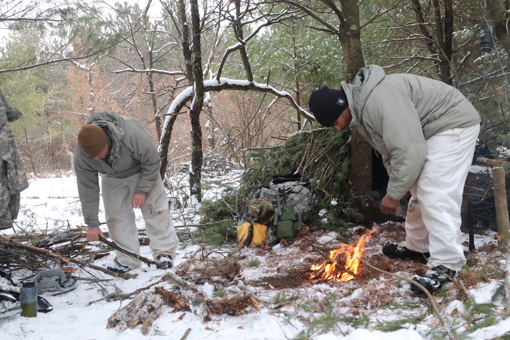 Cold-Weather Operations Course Class 20-02 students conduct field ops, improvised shelter construction