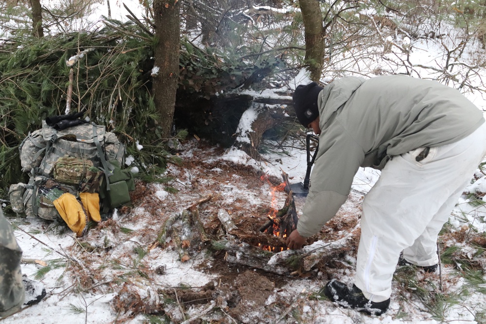 Cold-Weather Operations Course Class 20-02 students conduct field ops, improvised shelter construction