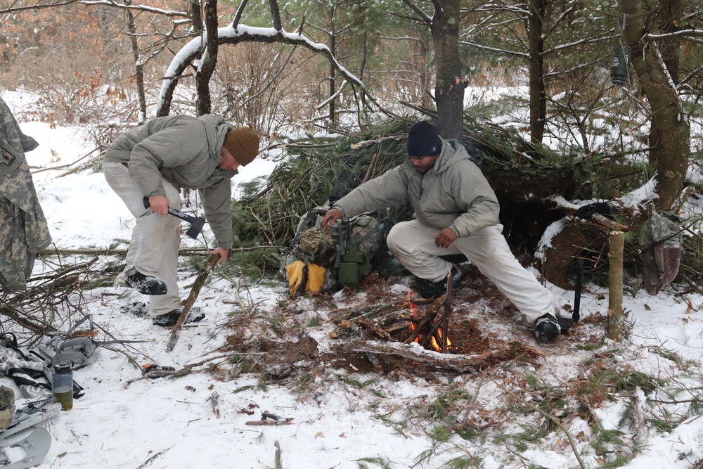 Cold-Weather Operations Course Class 20-02 students conduct field ops, improvised shelter construction