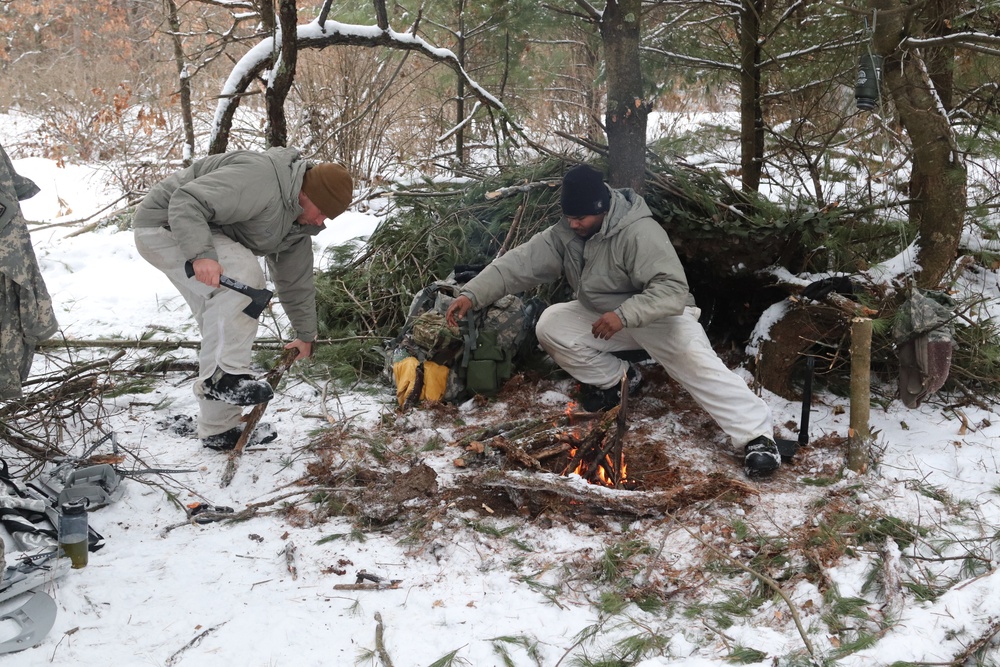 Cold-Weather Operations Course Class 20-02 students conduct field ops, improvised shelter construction