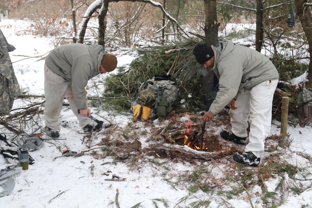 Cold-Weather Operations Course Class 20-02 students conduct field ops, improvised shelter construction