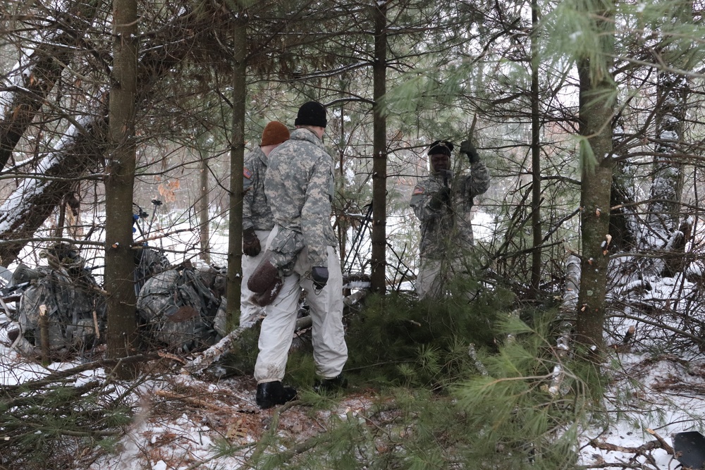 Cold-Weather Operations Course Class 20-02 students conduct field ops, improvised shelter construction