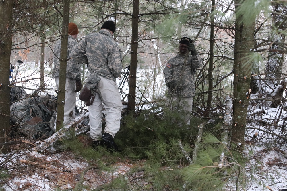 Cold-Weather Operations Course Class 20-02 students conduct field ops, improvised shelter construction
