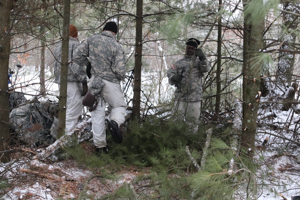 Cold-Weather Operations Course Class 20-02 students conduct field ops, improvised shelter construction