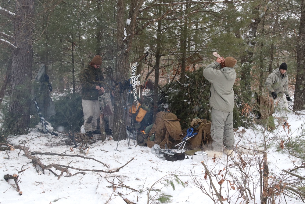 Cold-Weather Operations Course Class 20-02 students conduct field ops, improvised shelter construction