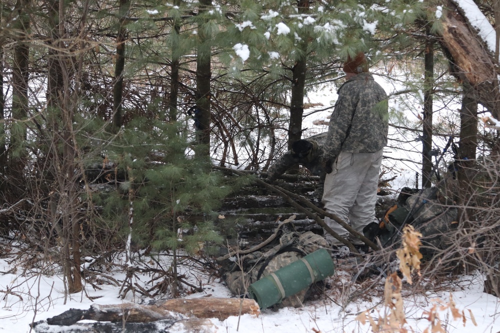Cold-Weather Operations Course Class 20-02 students conduct field ops, improvised shelter construction