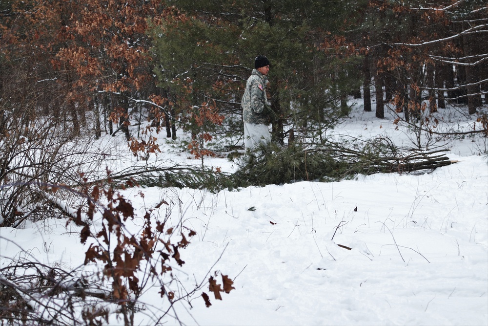 Cold-Weather Operations Course Class 20-02 students conduct field ops, improvised shelter construction