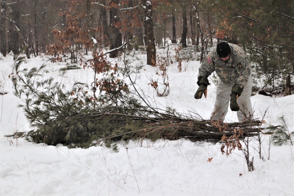 Cold-Weather Operations Course Class 20-02 students conduct field ops, improvised shelter construction
