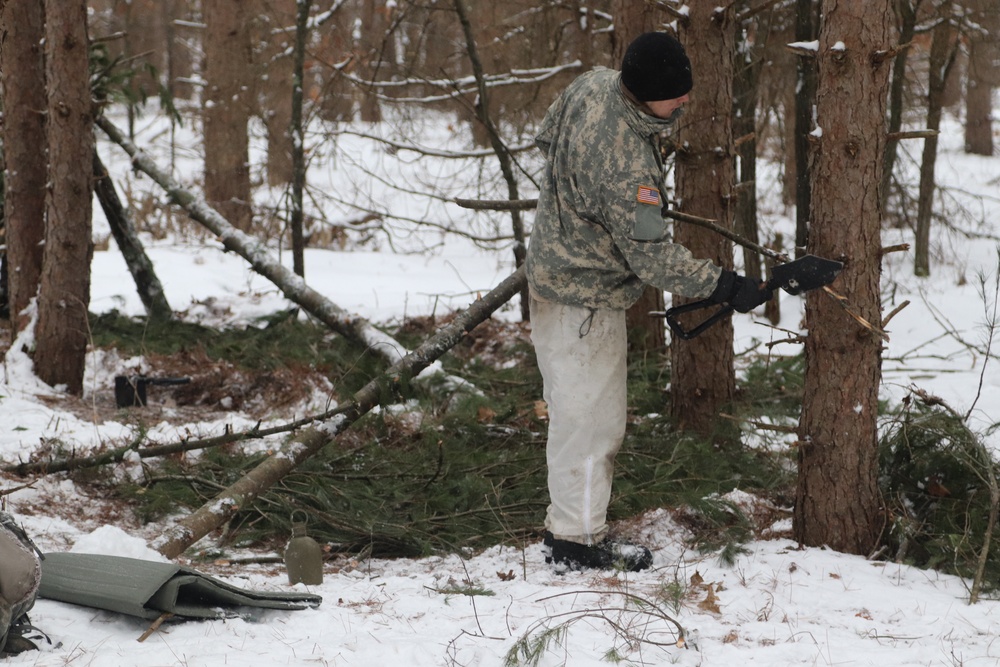 Cold-Weather Operations Course Class 20-02 students conduct field ops, improvised shelter construction