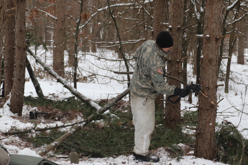 Cold-Weather Operations Course Class 20-02 students conduct field ops, improvised shelter construction