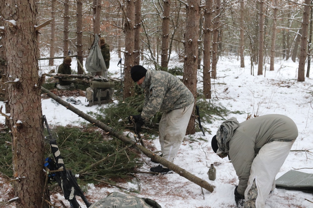 Cold-Weather Operations Course Class 20-02 students conduct field ops, improvised shelter construction