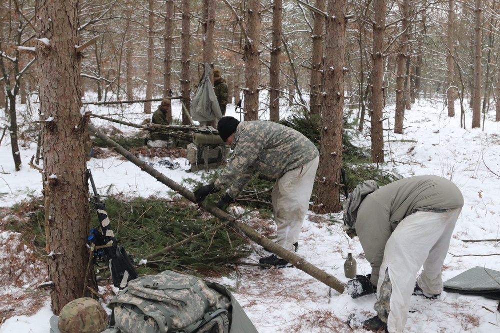 Cold-Weather Operations Course Class 20-02 students conduct field ops, improvised shelter construction