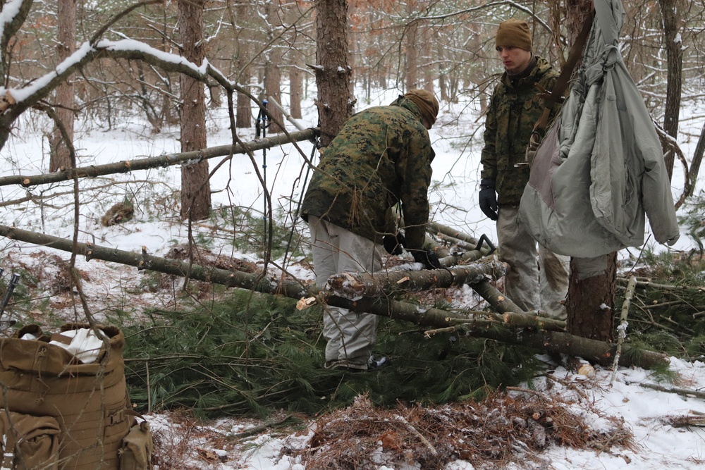 Cold-Weather Operations Course Class 20-02 students conduct field ops, improvised shelter construction