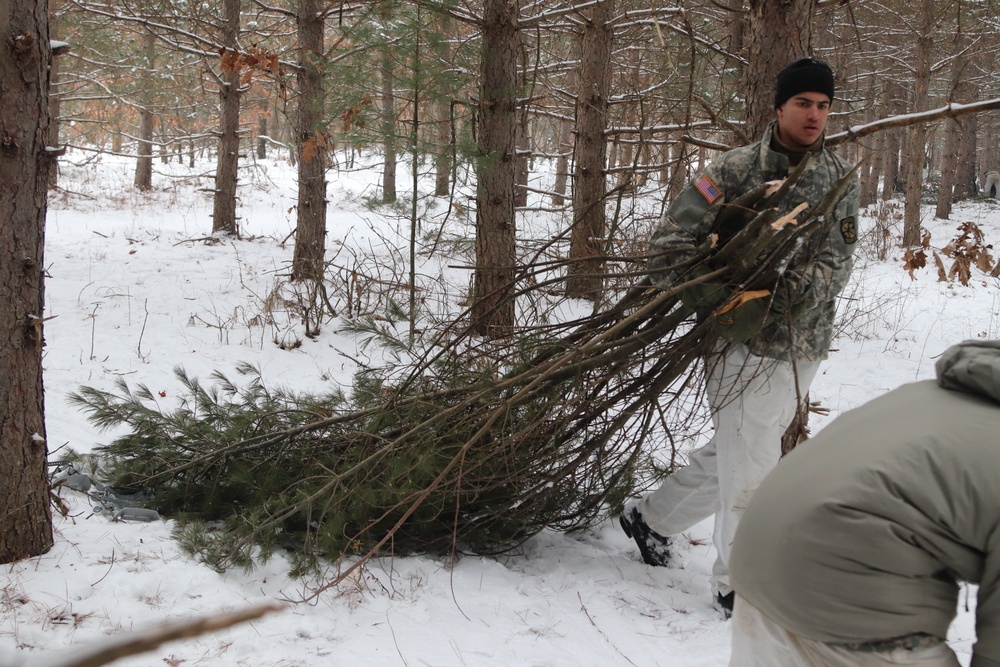 Cold-Weather Operations Course Class 20-02 students conduct field ops, improvised shelter construction