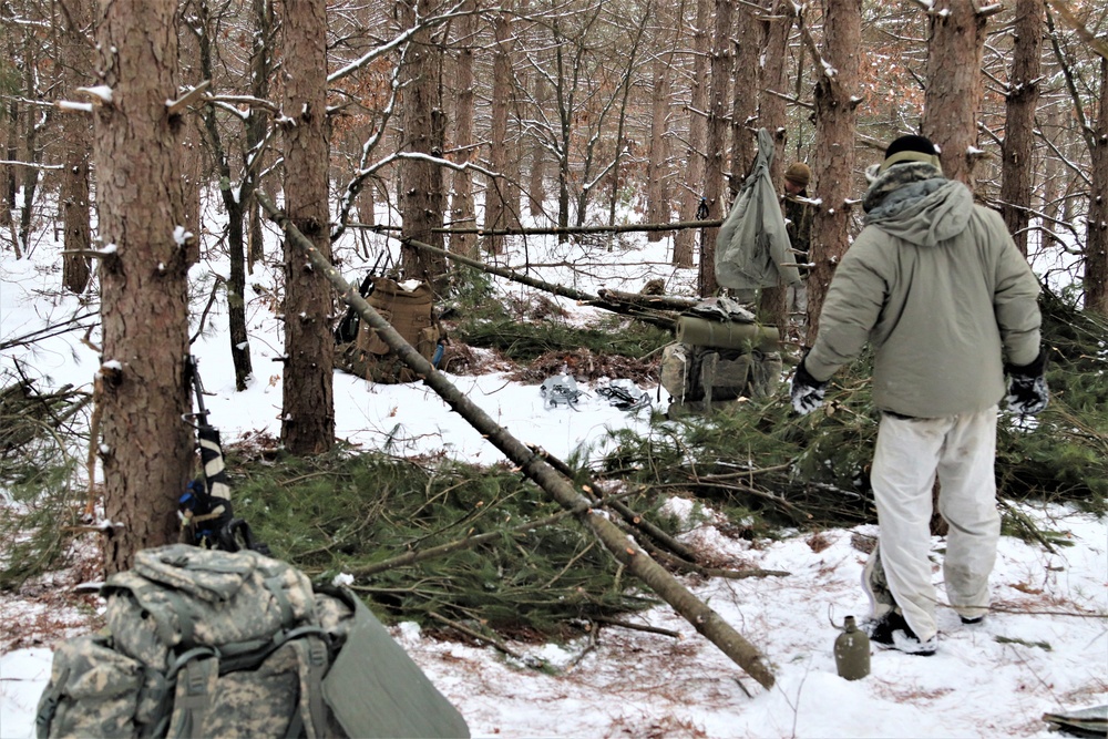 Cold-Weather Operations Course Class 20-02 students conduct field ops, improvised shelter construction