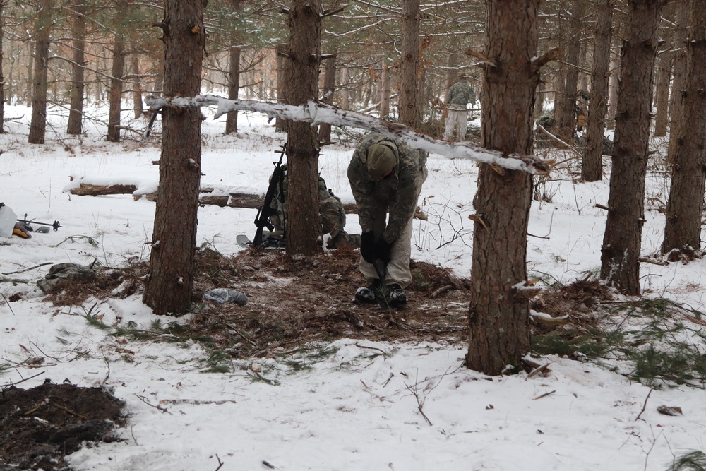 Cold-Weather Operations Course Class 20-02 students conduct field ops, improvised shelter construction