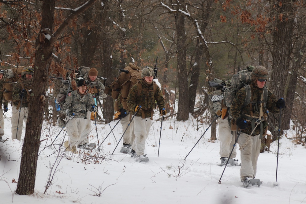 Cold-Weather Operations Course Class 20-02 students conduct field ops, improvised shelter construction
