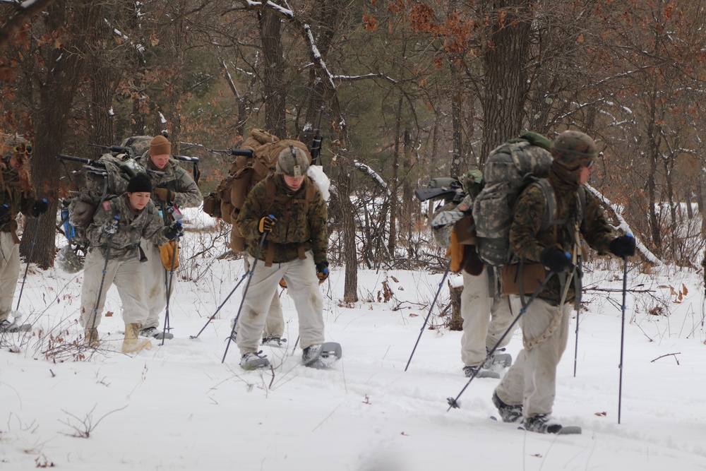 Cold-Weather Operations Course Class 20-02 students conduct field ops, improvised shelter construction