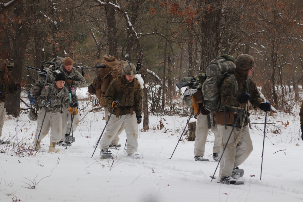 Cold-Weather Operations Course Class 20-02 students conduct field ops, improvised shelter construction