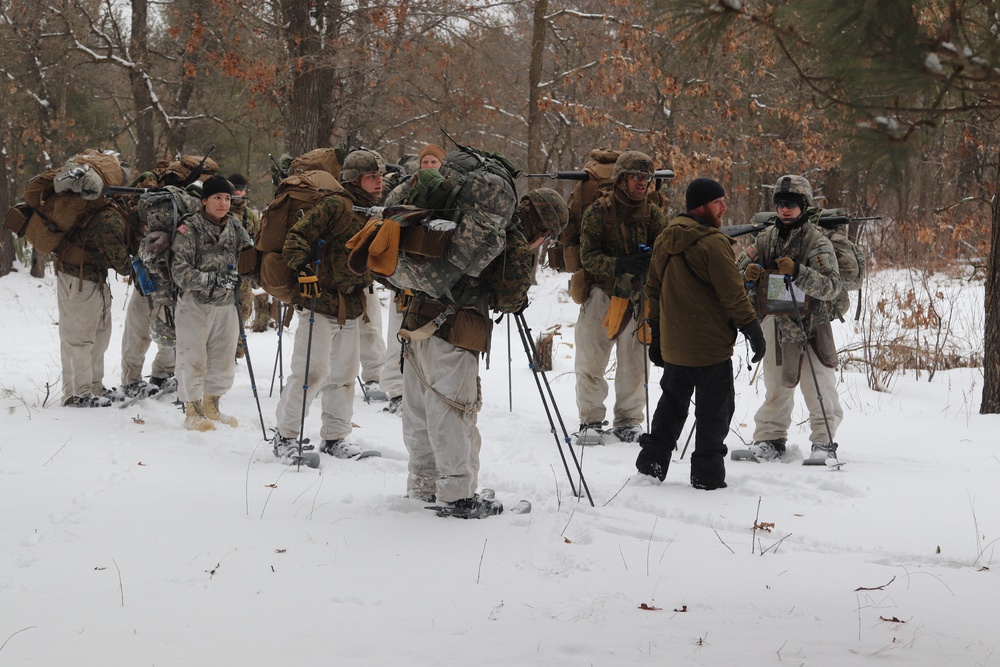 Cold-Weather Operations Course Class 20-02 students conduct field ops, improvised shelter construction