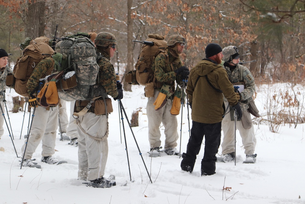Cold-Weather Operations Course Class 20-02 students conduct field ops, improvised shelter construction