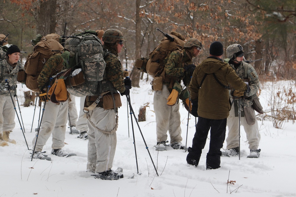Cold-Weather Operations Course Class 20-02 students conduct field ops, improvised shelter construction