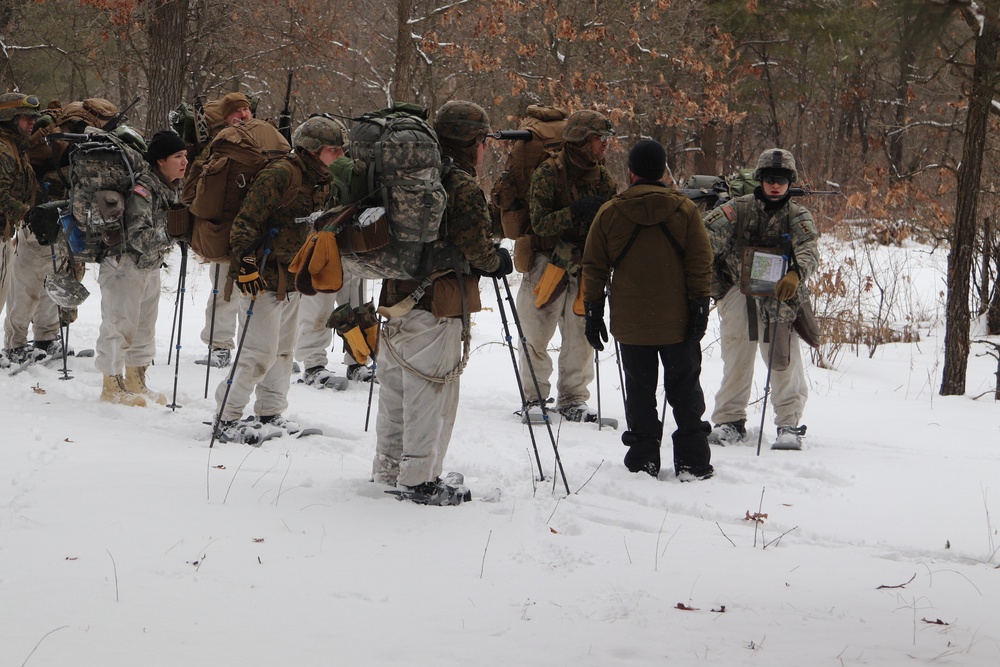 Cold-Weather Operations Course Class 20-02 students conduct field ops, improvised shelter construction