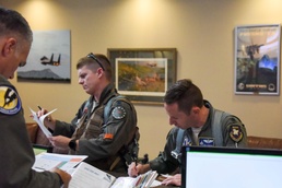 144th Flies in Orange Flag