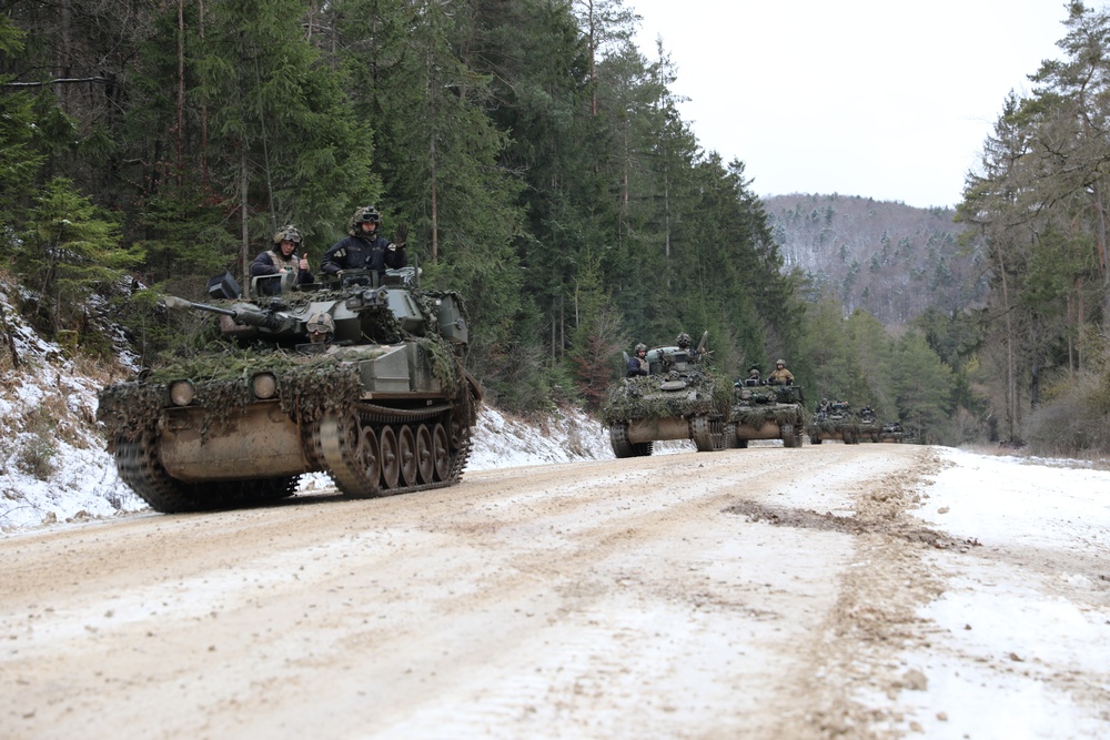 Opposing forces patrols for objectives during training exercise Combined Resolve XIII