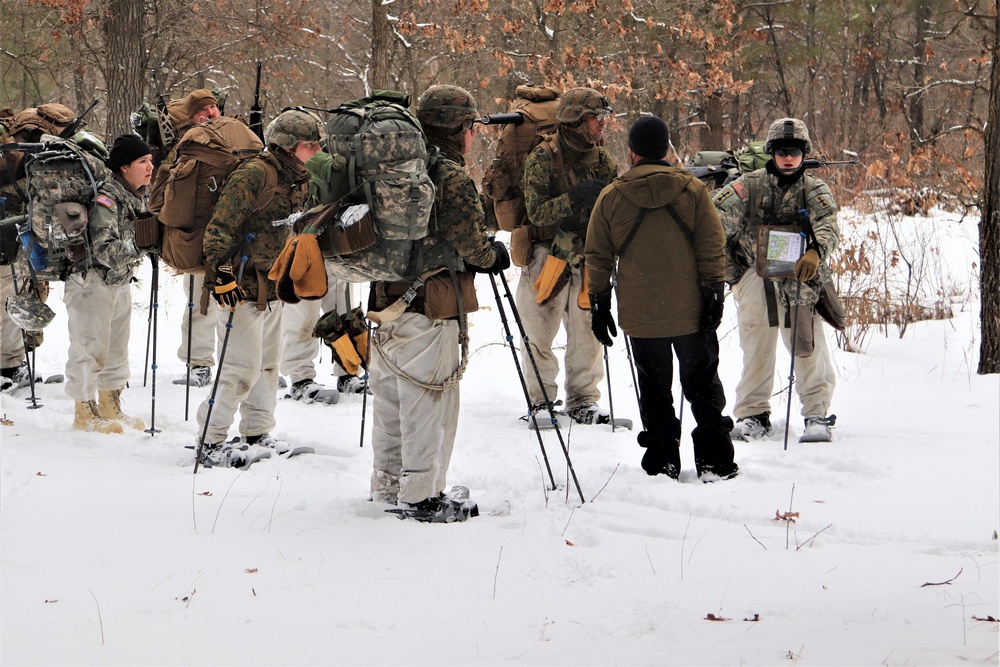 Cold-Weather Operations Course Class 20-02 students conduct field ops, improvised shelter construction