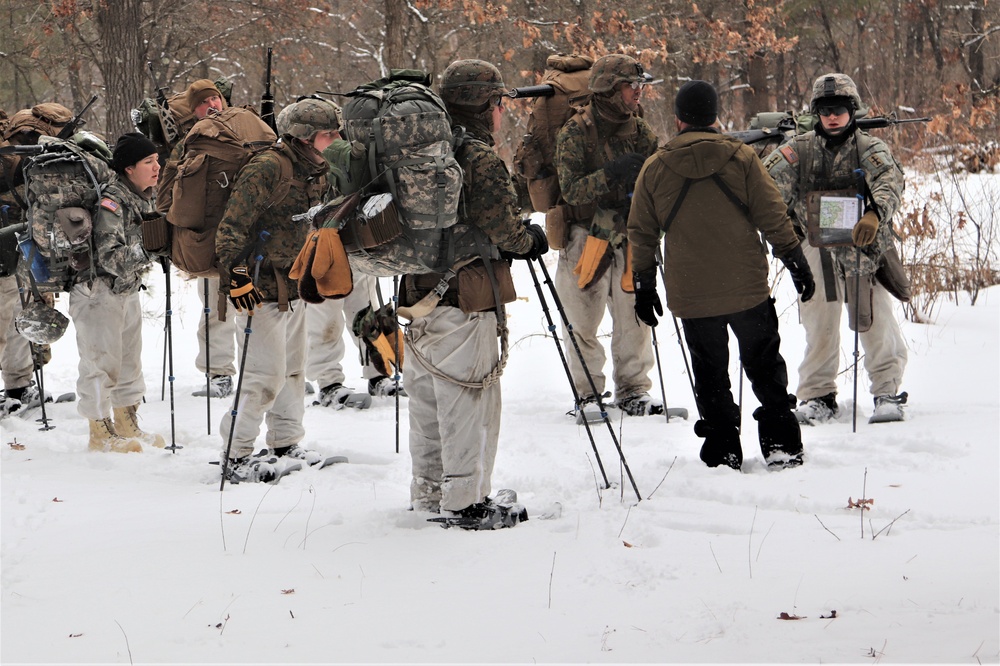 Cold-Weather Operations Course Class 20-02 students conduct field ops, improvised shelter construction