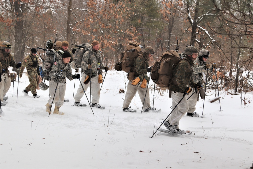 Cold-Weather Operations Course Class 20-02 students conduct field ops, improvised shelter construction