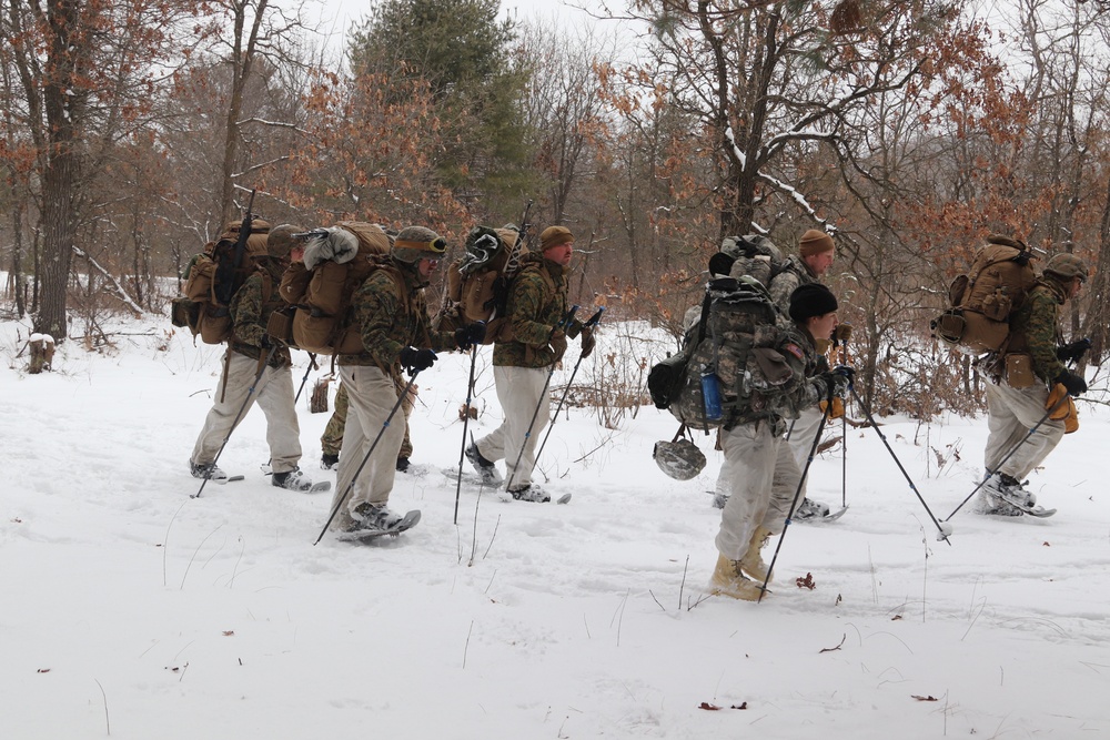 Cold-Weather Operations Course Class 20-02 students conduct field ops, improvised shelter construction