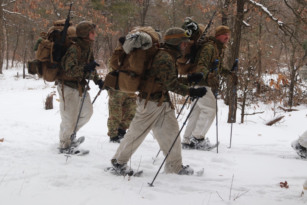 Cold-Weather Operations Course Class 20-02 students conduct field ops, improvised shelter construction