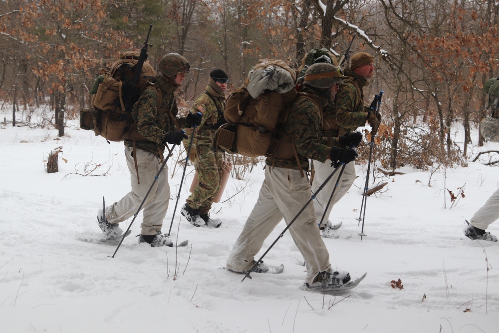 Cold-Weather Operations Course Class 20-02 students conduct field ops, improvised shelter construction