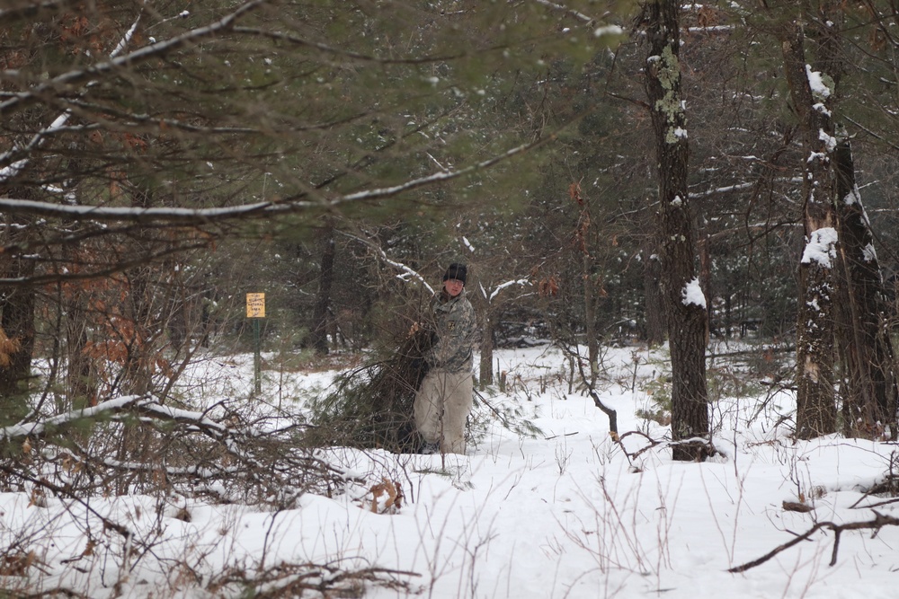 Cold-Weather Operations Course Class 20-02 students conduct field ops, improvised shelter construction