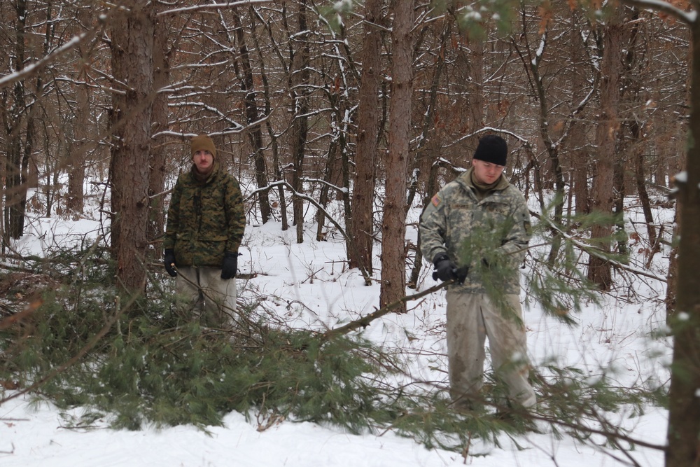 Cold-Weather Operations Course Class 20-02 students conduct field ops, improvised shelter construction