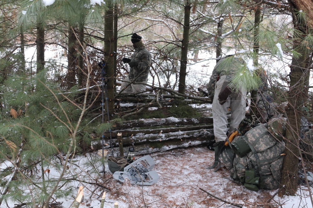 Cold-Weather Operations Course Class 20-02 students conduct field ops, improvised shelter construction