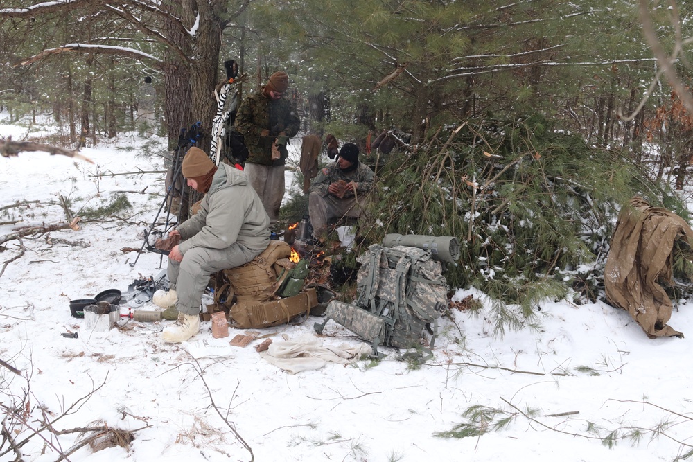 Cold-Weather Operations Course Class 20-02 students conduct field ops, improvised shelter construction