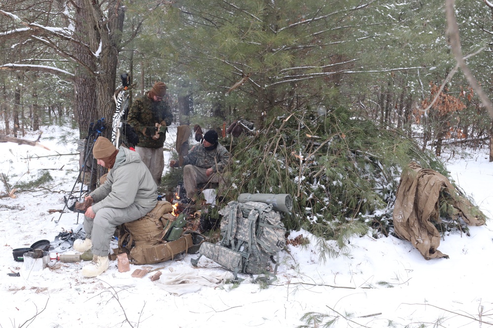 Cold-Weather Operations Course Class 20-02 students conduct field ops, improvised shelter construction