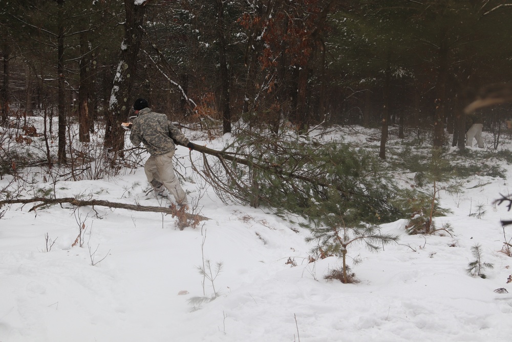 Cold-Weather Operations Course Class 20-02 students conduct field ops, improvised shelter construction