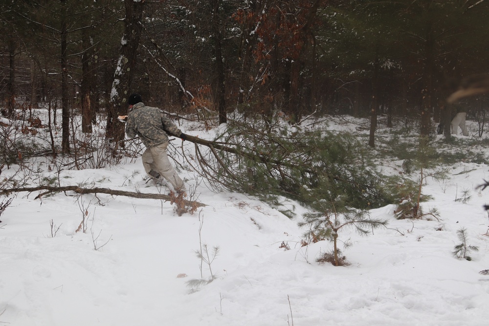 Cold-Weather Operations Course Class 20-02 students conduct field ops, improvised shelter construction