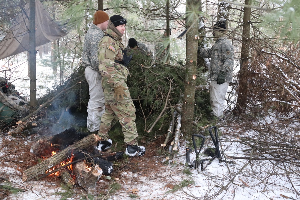 Cold-Weather Operations Course Class 20-02 students conduct field ops, improvised shelter construction