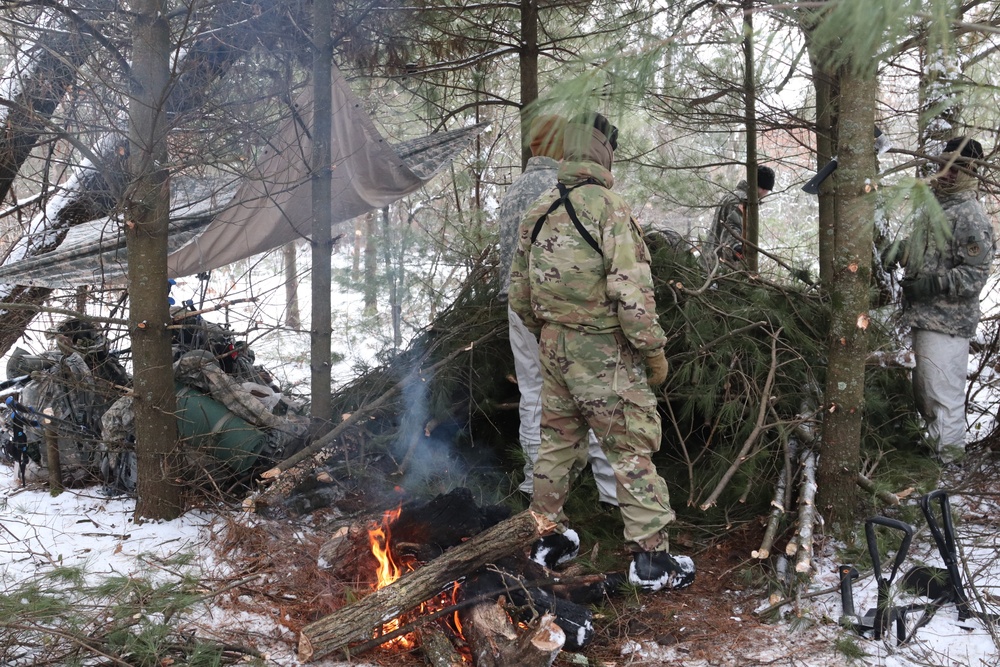Cold-Weather Operations Course Class 20-02 students conduct field ops, improvised shelter construction