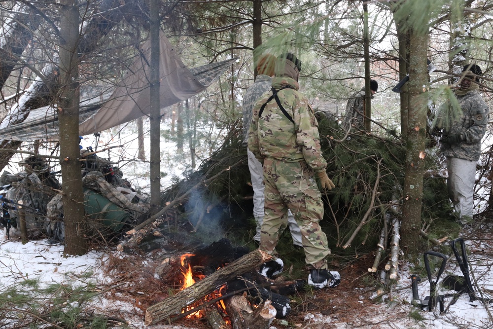 Cold-Weather Operations Course Class 20-02 students conduct field ops, improvised shelter construction